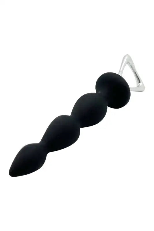 Bouchon anal en perles noires avec poignée en argent.
