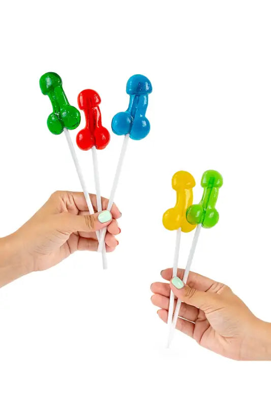 Sucettes de forme phallique de différentes couleurs.