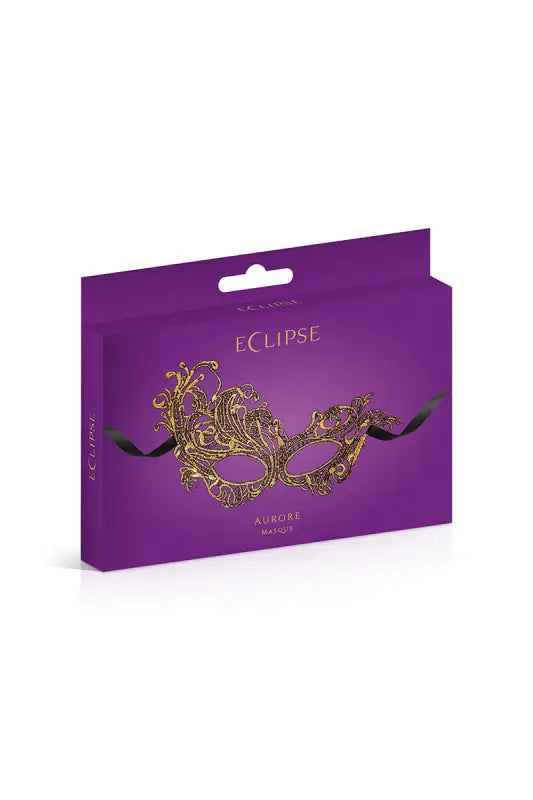 Boîte violette avec un masque doré.