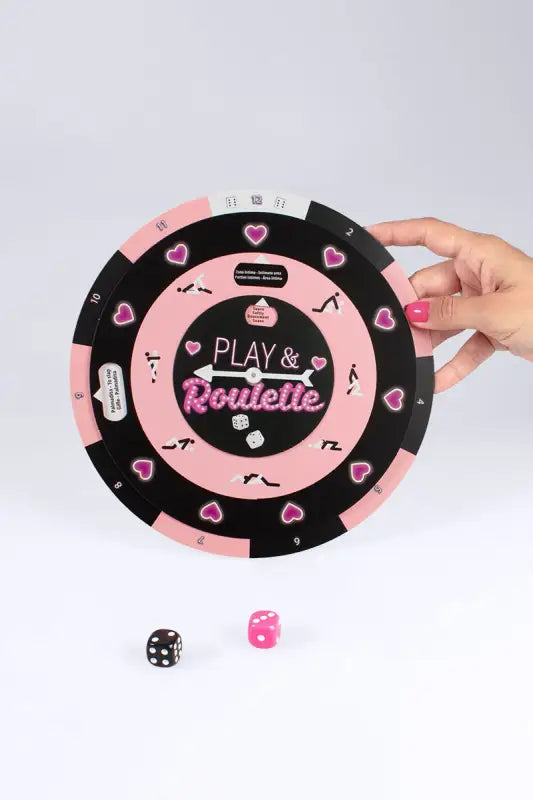 Jeu de roulette rose et noir.
