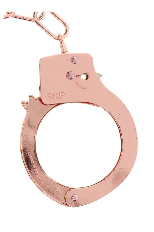 Menottes en or rose.
