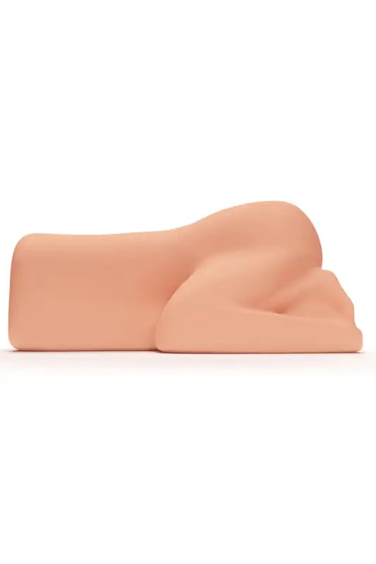 Jouet sexuel de couleur chair fessier d'une femme en levrette
