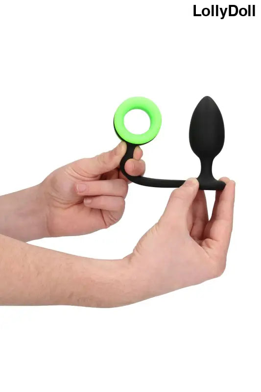 Plug anal en silicone noir et cockring vert phosphorescent sur LollyDoll