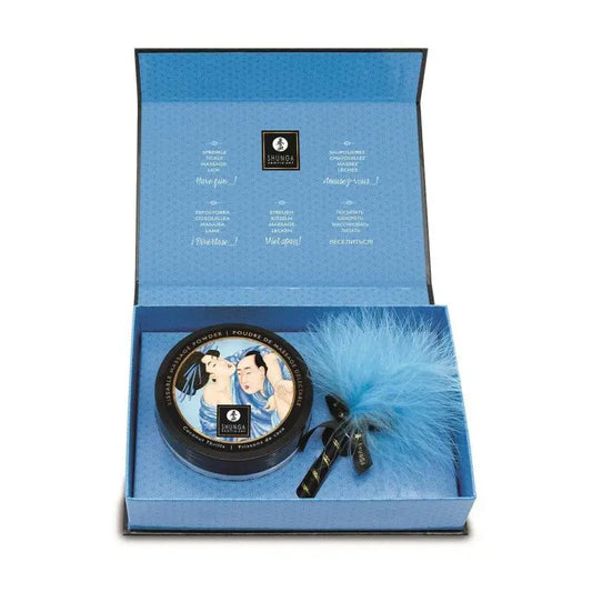 Poudre de massage délectable et son plumeau bleu - Frissons de coco sur LollyDoll votre fournisseur de plaisir