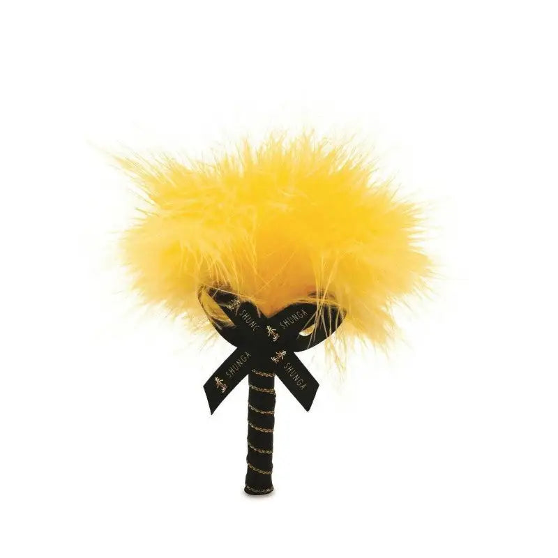 Plumeau comprit avec la Poudre de massage délectable - Mangue enivrante chez LollyDoll.fr