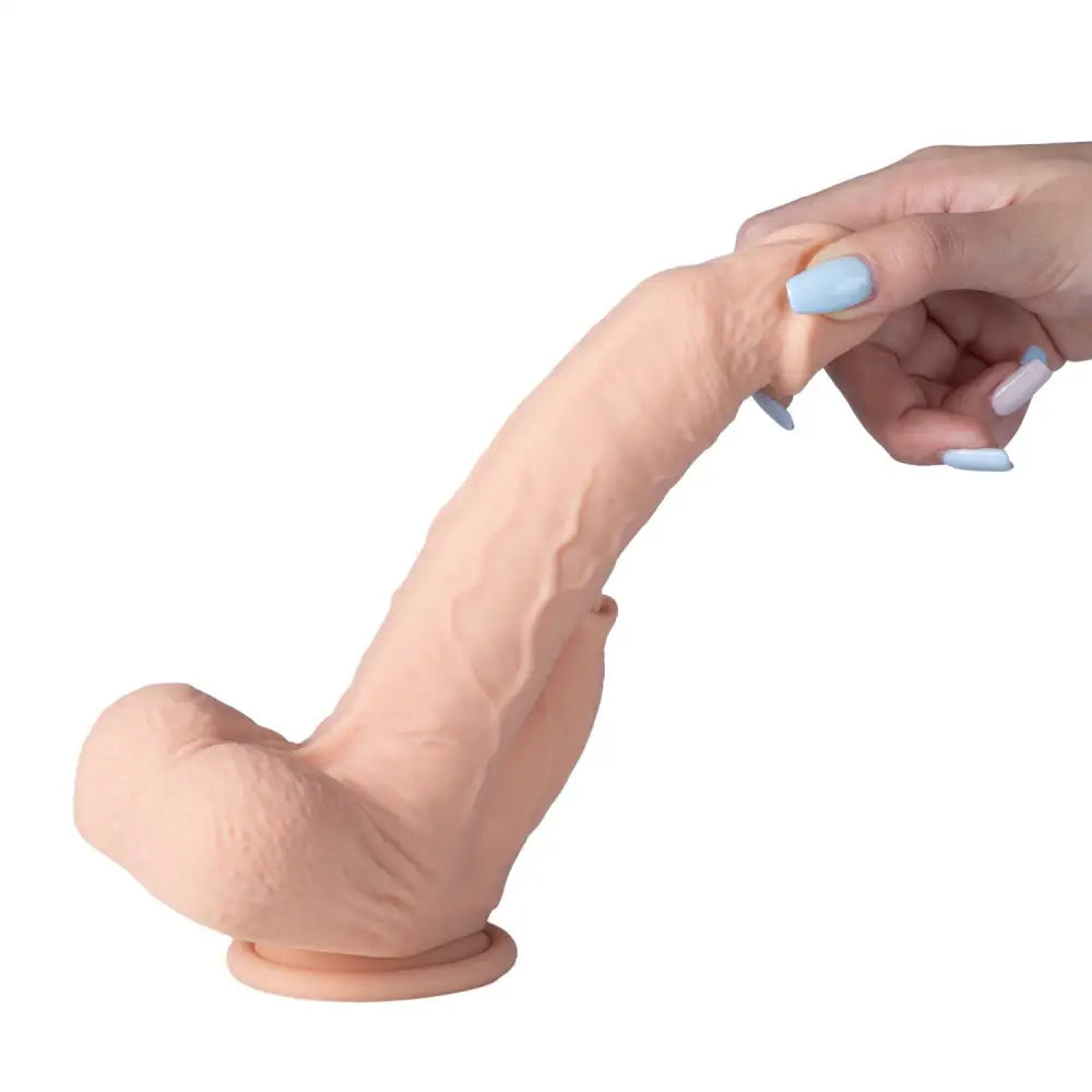 Image d'un colter gode réaliste vibrant va-et-vient et lécheur de 21 cm en couleur chair. disponible chez LollyDoll