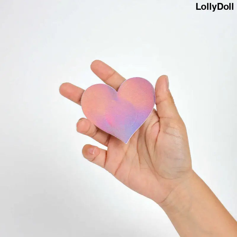 Découvrez les cache-tétons en forme de cœur 'WOW BOOBS !' pour une touche sensuelle et audacieuse. Parfaits pour compléter votre ensemble de lingerie, ces accessoires séduisants sauront mettre en valeur votre silhouette avec élégance. Disponible chez LollyDoll pour un look glamour et sexy assuré.