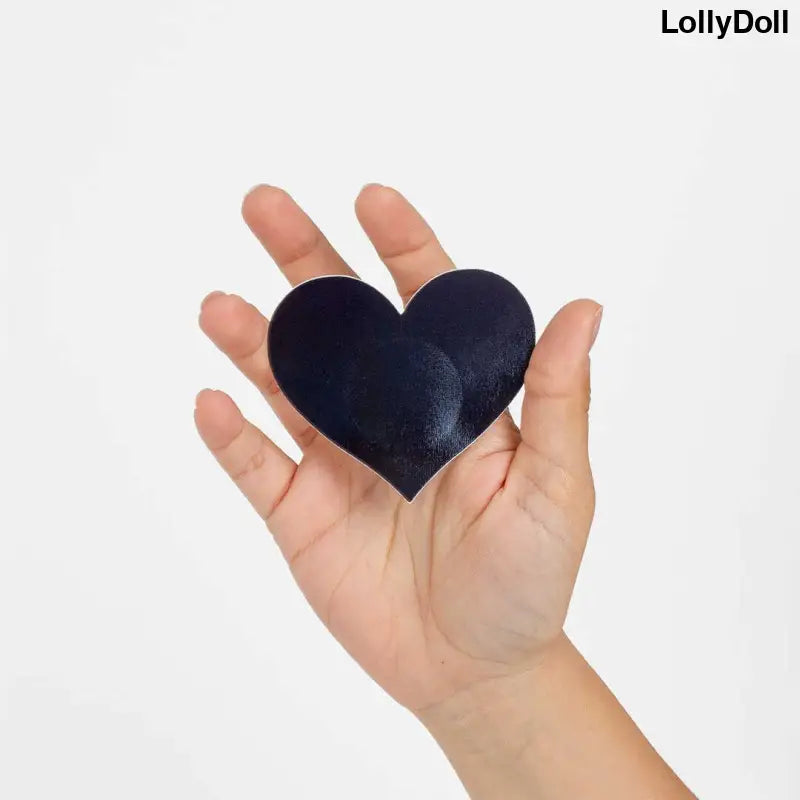Découvrez les cache-tétons en forme de cœur 'WOW BOOBS !' pour une touche sensuelle et audacieuse. Parfaits pour compléter votre ensemble de lingerie, ces accessoires séduisants sauront mettre en valeur votre silhouette avec élégance. Disponible chez LollyDoll pour un look glamour et sexy assuré.