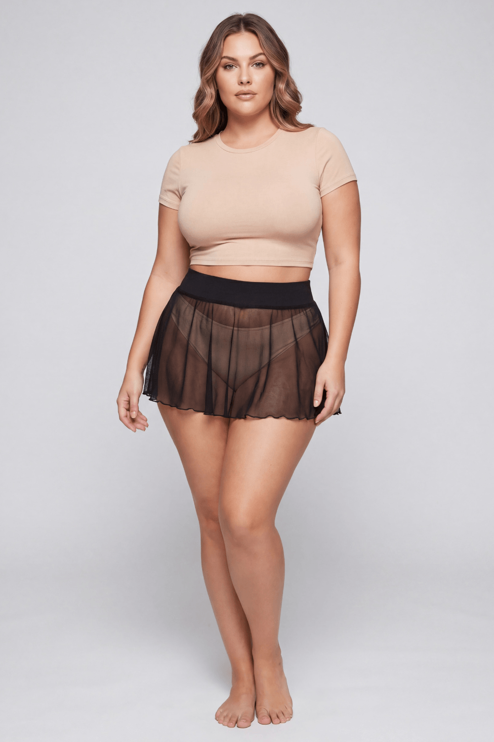 Mini jupe noire en résille transparente Stella