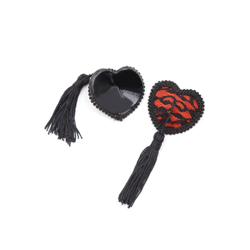 Cache tétons cœur dentelle noire pompom — détail de la face adhésive repositionnable