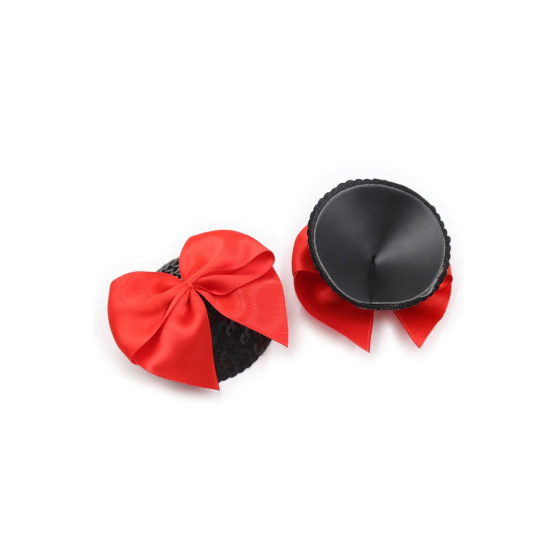 Cache tétons nœud papillon noir rouge satin — détail de la face adhésive repositionnable