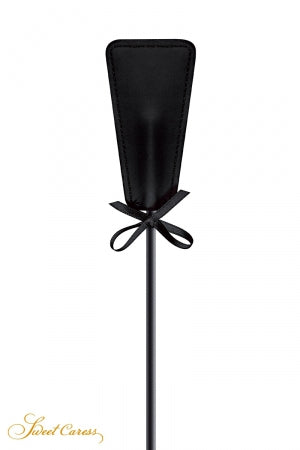 Tapette avec pompon noir