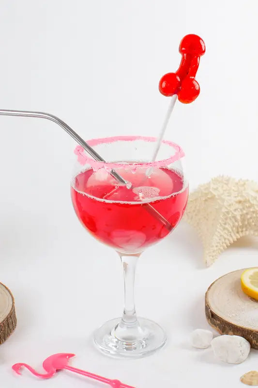 Cocktail rouge avec sucette suggestive.
