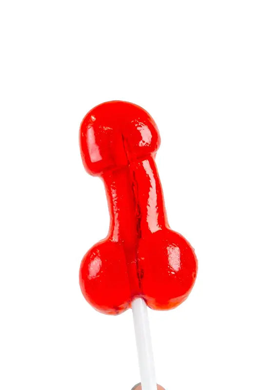 Sucette rouge en forme de pénis.