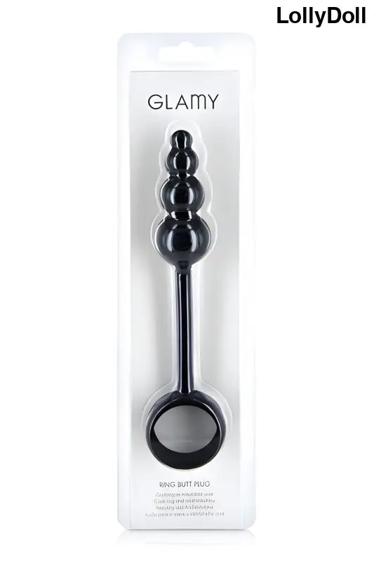 Plug anal noir combiné avec un cockring dans sa boite transparente de Glamy disponible sur LollyDoll.